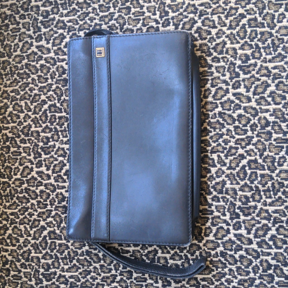 Dunhill clutch men or women.